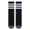 a pair of black socks laid flat featuring a grey heathered toe and heel and 3 monochromatic stripes near the cuff