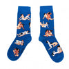 Shown in a flatlay, a pair of women's CouCou Suzette cotton crew socks in deep blue with lesbian lovers engaging in varying Kama Sutra sex positions all over the socks.