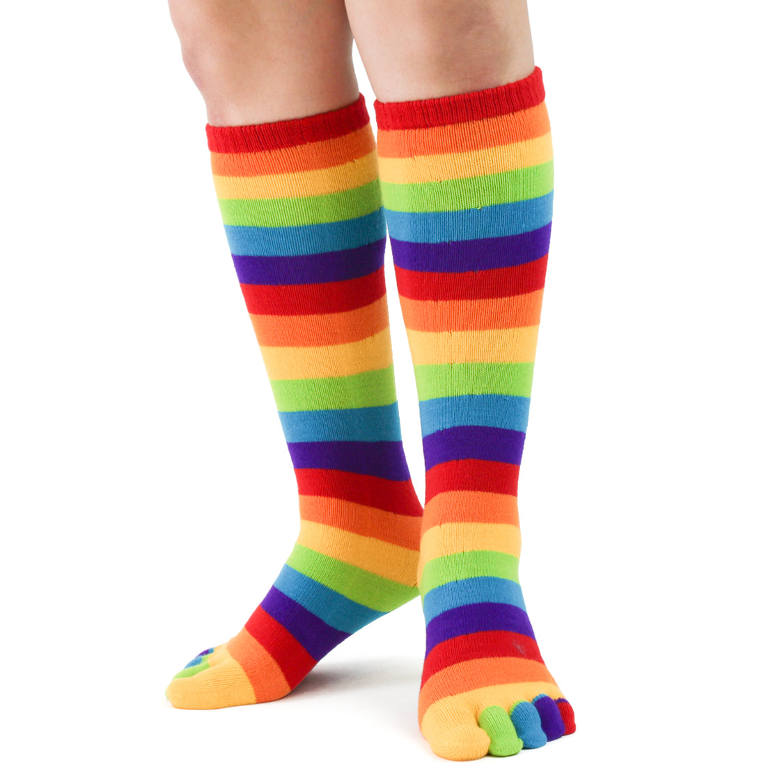 Model's feet wear a pair of rainbow-striped toe socks