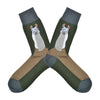 Shown in a flatlay, a pair of Foot Traffic green cotton men's crew socks with llama and brown foot