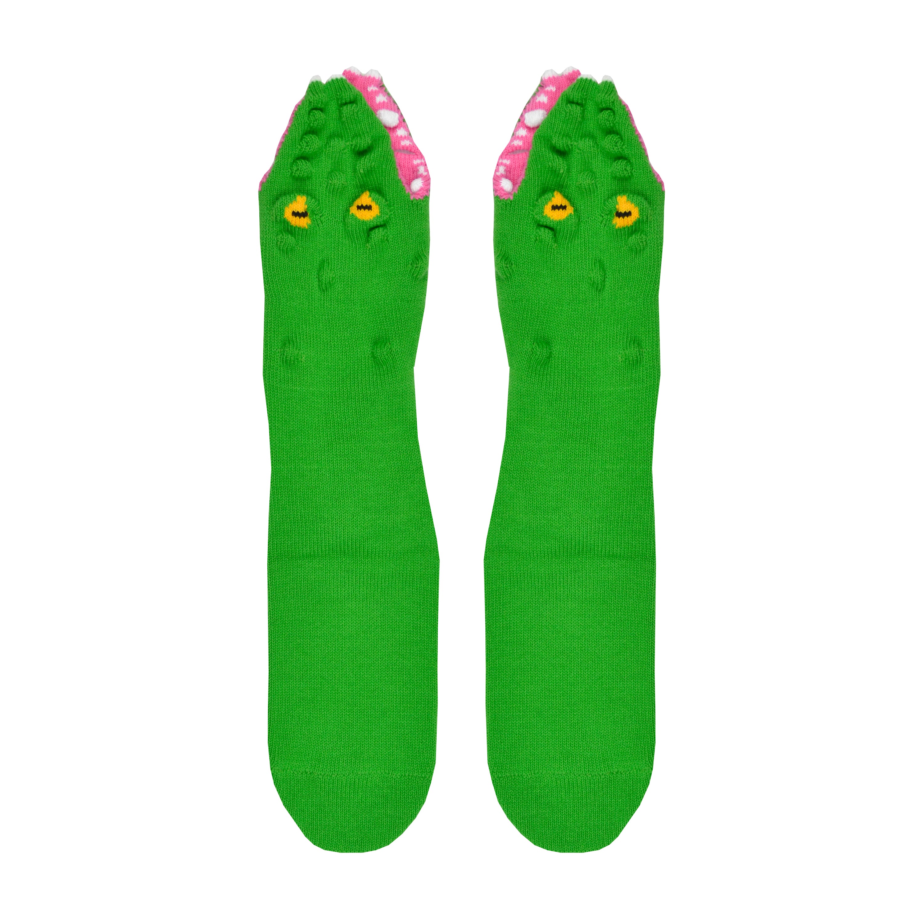 Shown in a flatlay, a pair of Foot Traffic, green cotton women's crew socks with three dimensional pattern of scaly alligator eating the foot