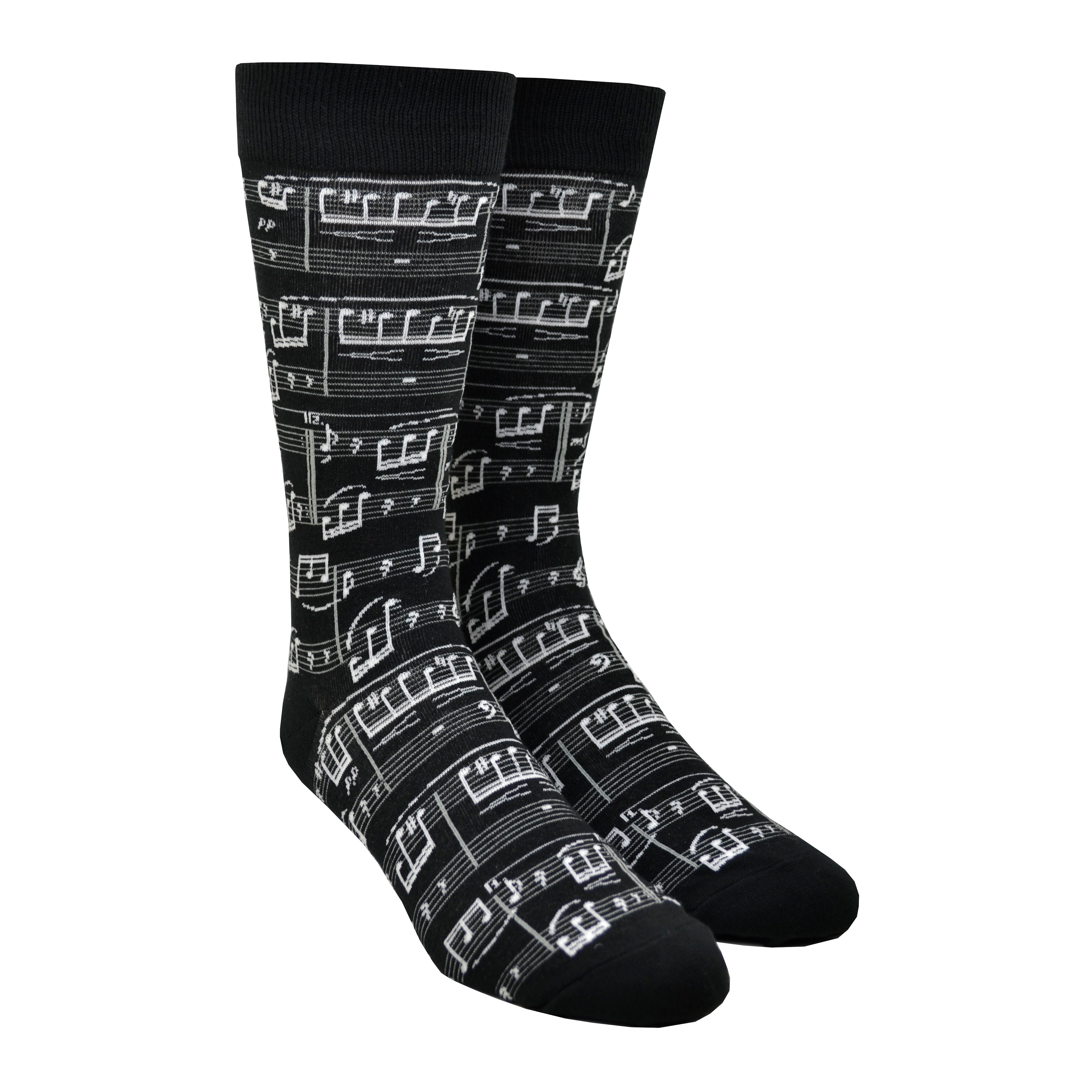 A black cotton Men's crew sock by Modsock is shown on a mannequin foot form featuring a sheet music design from its top to bottom.