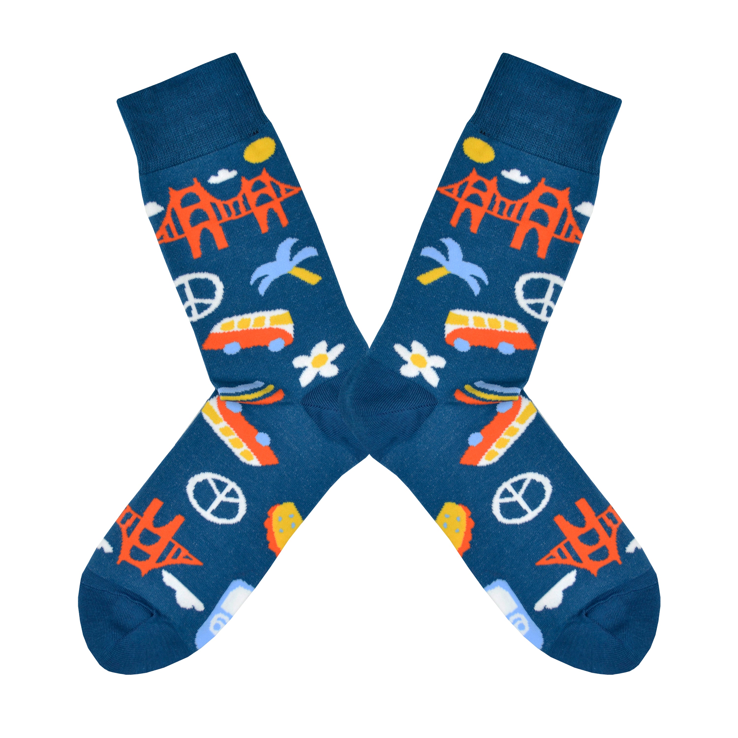 Shown in a flatlay, a pair of Yellow Owl Workshop’s navy blue nylon-cotton men's crew socks with San Francisco Golden Gate Bridge, peace sign, palm tree, daisy, VW bus and highway One sign