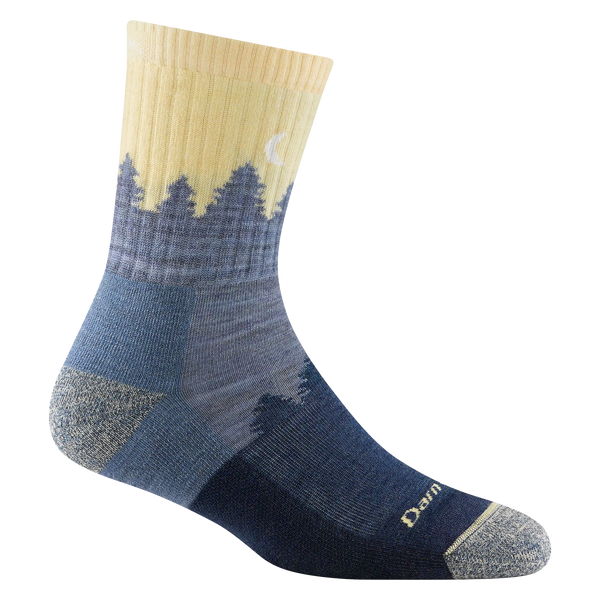 Blue quarter crew sock with treeline pattern and yellow sky on ankle