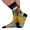 Sock with cartoon dog and flames design on a white background