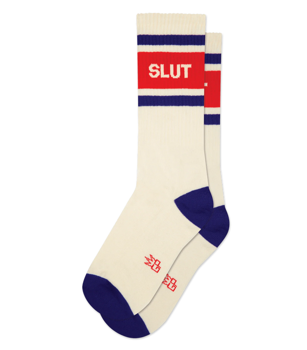 Cream-colored socks with red & purple accents, & text that reads "SLUT"