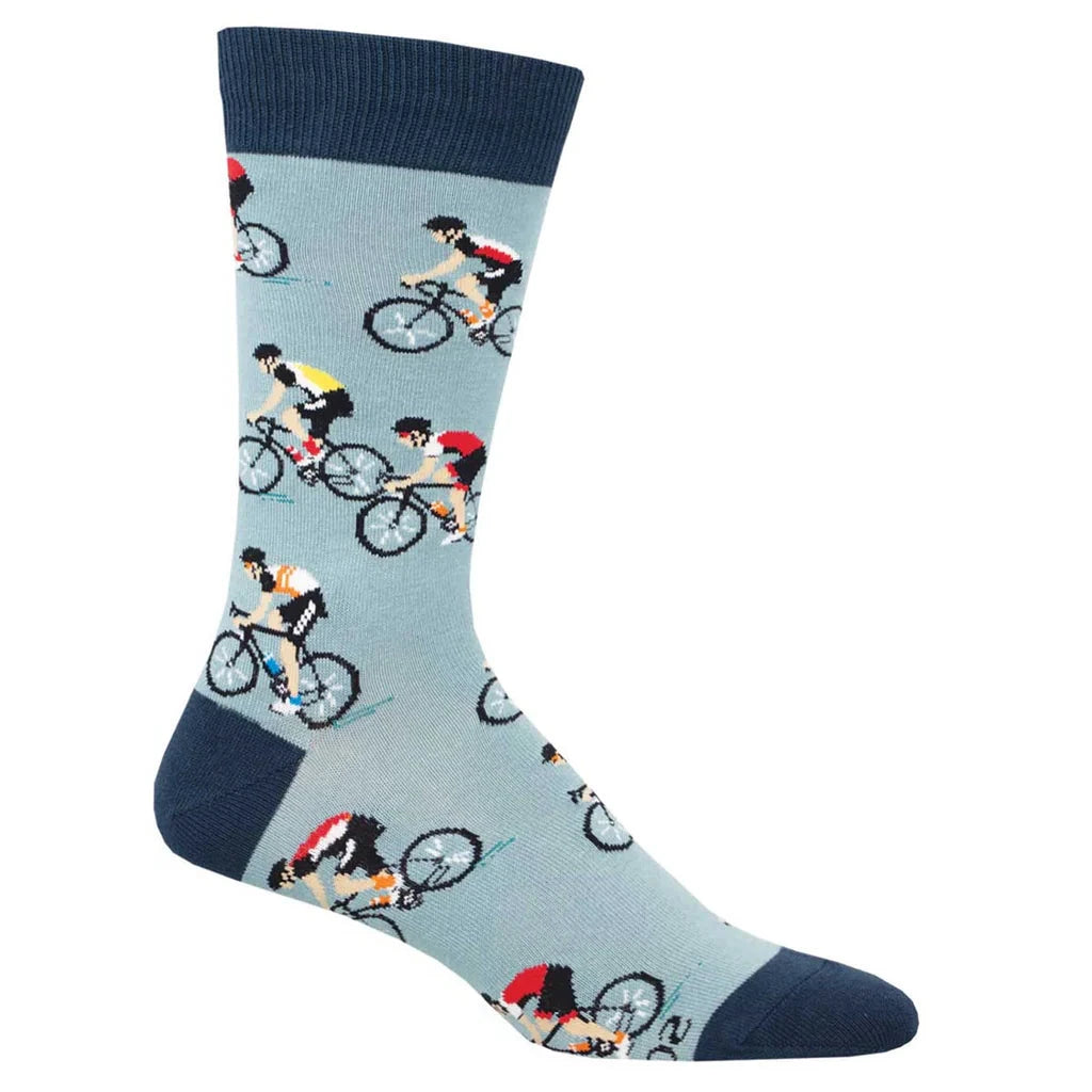 Foot form wears a blue crew sock with navy heel, toe & ankle featuring road cyclists biking in the same direction