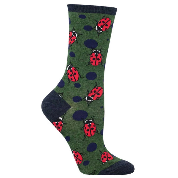 Foot form wears green crew sock with dark gray heel, toe & ankle, navy blue polka dots and ladybugs