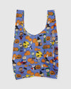 Baggu with Halloween-themed design featuring Peanuts characters and pumpkins on a blue background