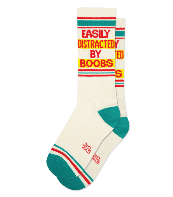 Cream socks with red & teal accents, with red text that reads "EASILY DISTRACTED BY BOOBS"