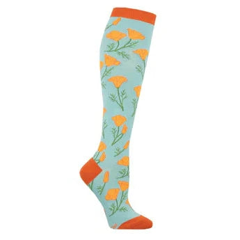 Leg form wears blue knee high sock with orange, heel, toe and ankle featuring orange poppies