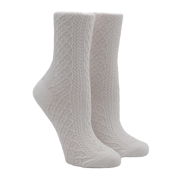 Two waffle-textured white socks on foot forms
