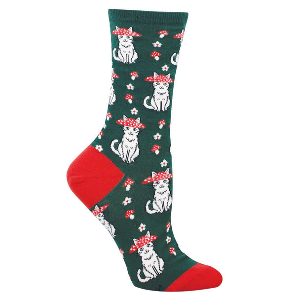 Green sock on foot form featuring white cats with mushroom hats and little red mushrooms