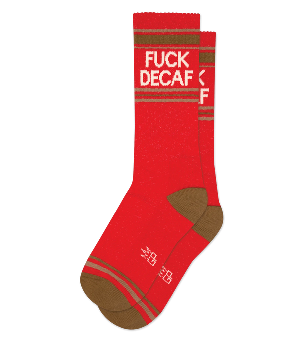 Pair of red crew socks in flatlay with brown heel & toe, brown & gray stripe patterns near the toe & leg, and cream text that reads "FUCK DECAF"