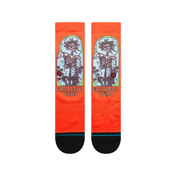 a red pair of officially licensed grateful dead socks featuring art from their iconic album covers