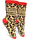 Leopard print crew socks with orange accents with text that reads "Feeling a little cunty today"
