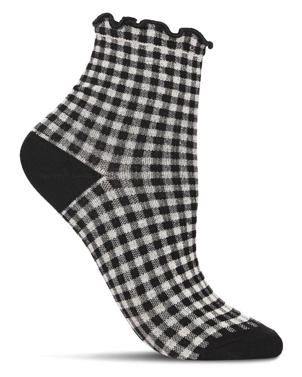 White background, black-and-white gingham anklet with ruffled top on a foot form