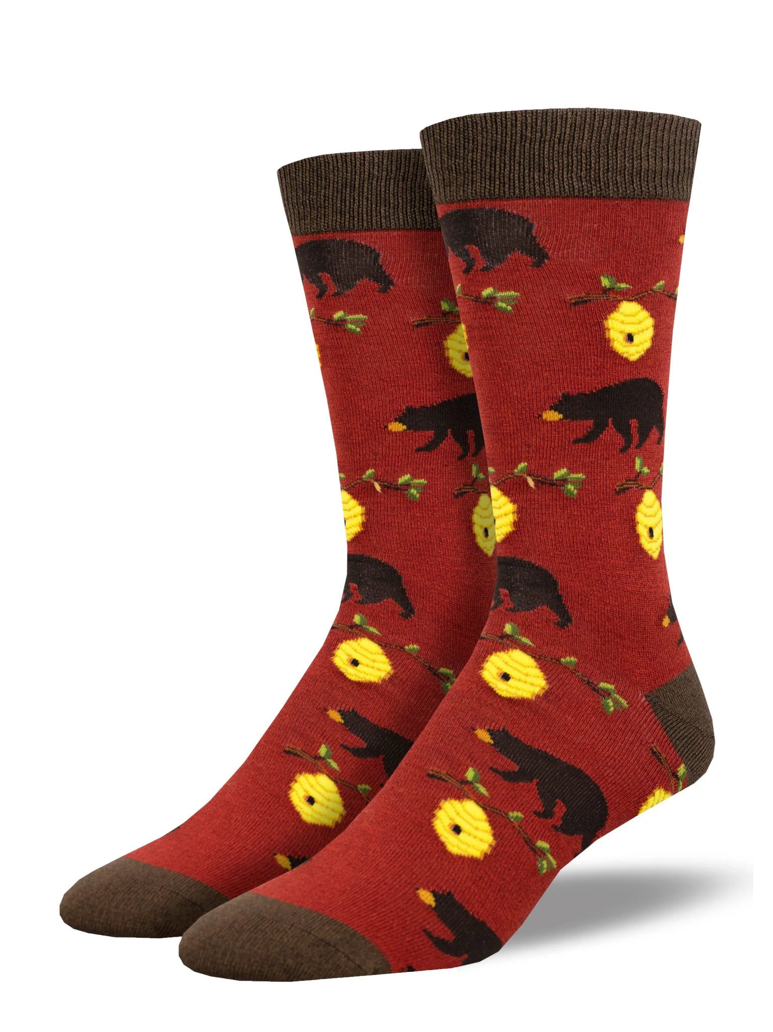Shown on men's leg froms, a pair of bamboo socks in red with a brown heel, toe, and, cuff. These socks feature an all over motif of grizzly bears and honey bee hives on a branch.