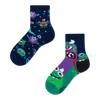 a pair of mismatched childrens socks, one navy blue with a pattern of multicolored monsters or aliens, the other featuring three big monsters in shades of purple and green