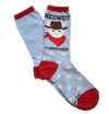 Blue socks with red trim in flatlay that feature a cowboy cat and text that reads "MEOWDY PURRRTNER"