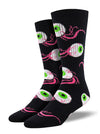 Shown on leg forms, these unisex black athletic socks have an all over motif of eyeballs with a green iris and the optic nerve still attached.