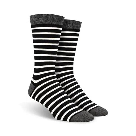 Black and white striped socks with gray toes and heels on a white background