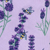 close up of lavender socks with small purple flowers and bumble bees