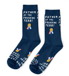 a pair of navy blue socks with small gold medals and white text that reads FATHER F THE FREAKING YEAR