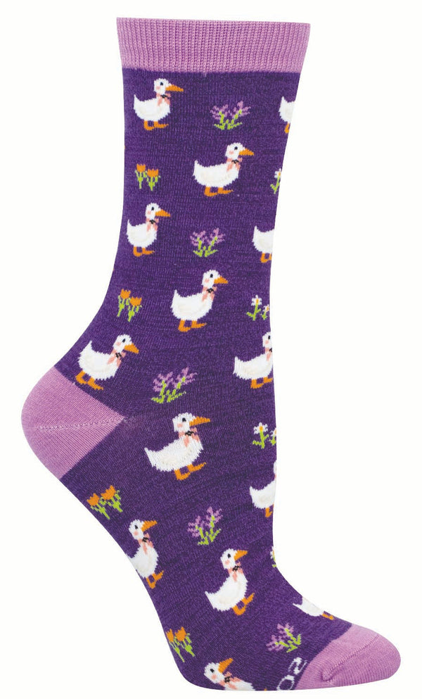 Purple suck featuring white ducks wearing ribbons and wildflowers