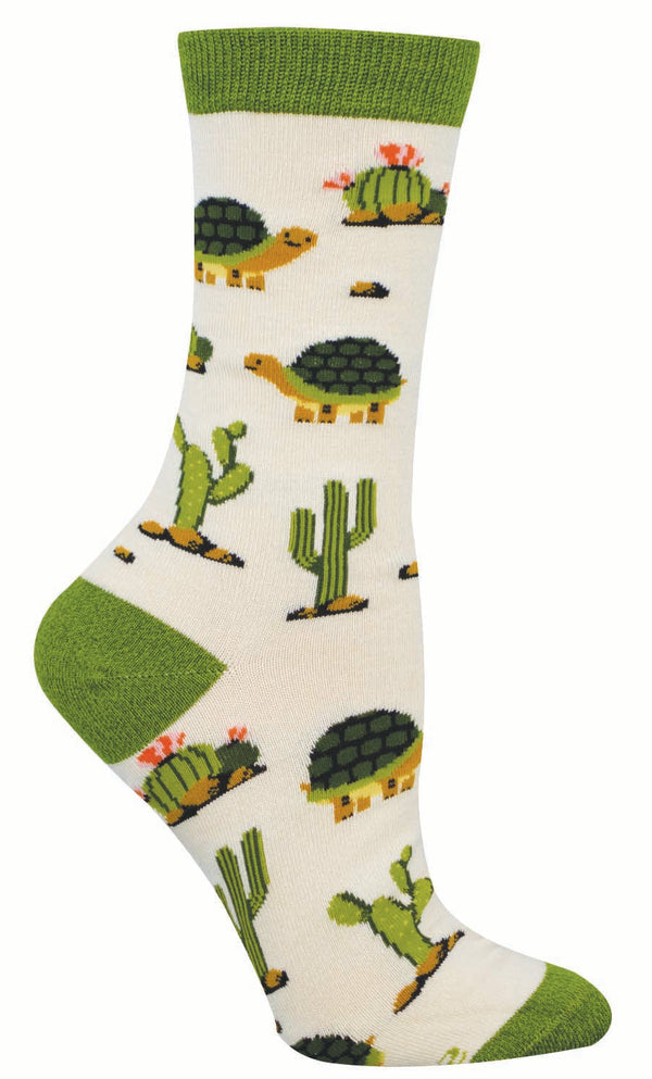 Ivory sock with tortoise and cactus pattern on a white background