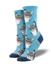 On leg forms a pair of blue crew socks with a gray and white cat's face all over. The word "BOOP" spelled out all over the socks.