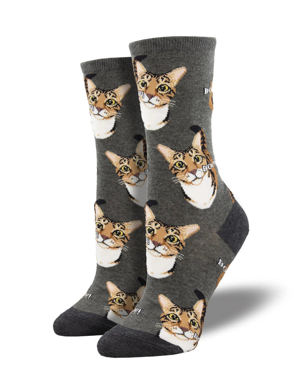 On leg forms a pair of grey heather crew socks with a orange and white cat's face all over. The word "BOOP" spelled out all over the socks.