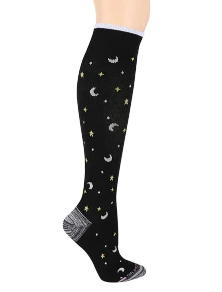 black knee high sock on a leg form with a heathered grey toe and heel and pattern of petite white and gold stars and crescent moons
