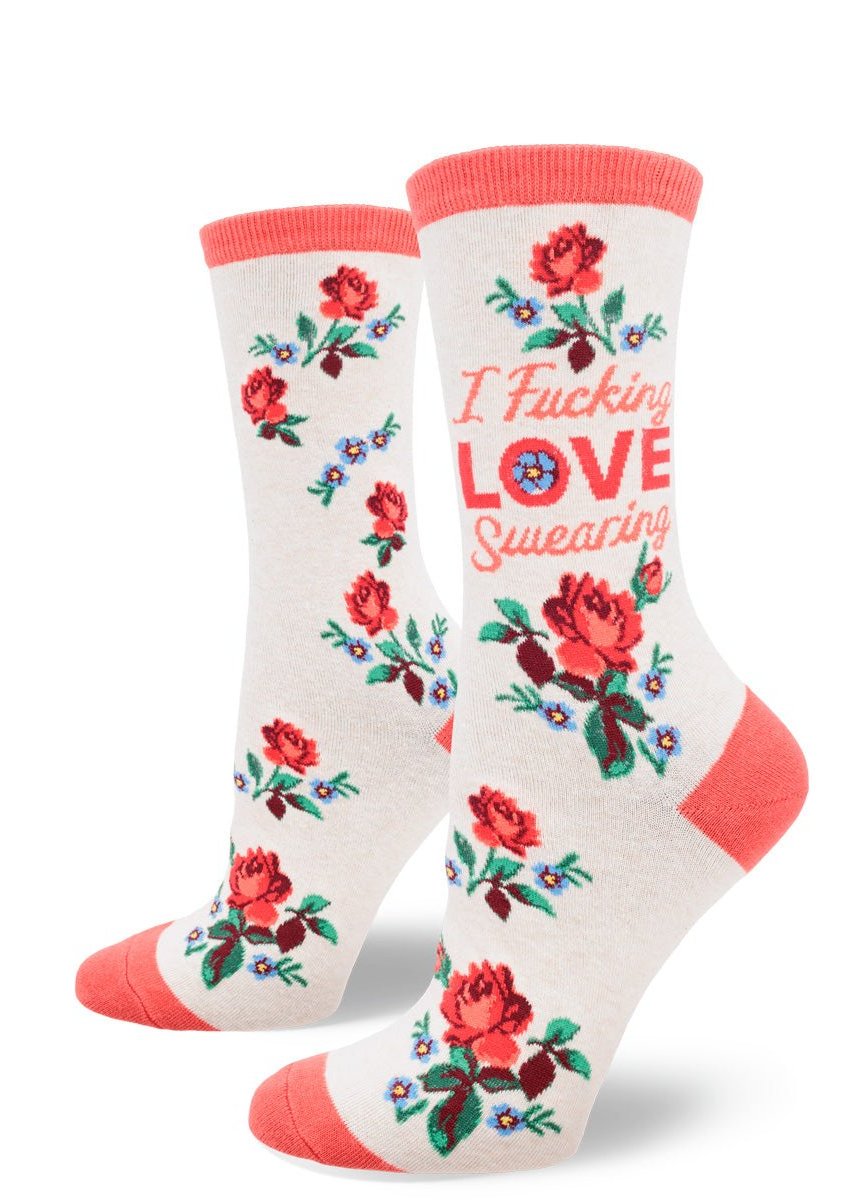 White background, pair of heather socks with red toe, heel, ankle; arrangements of roses and forget-me-nots and red text that reads 