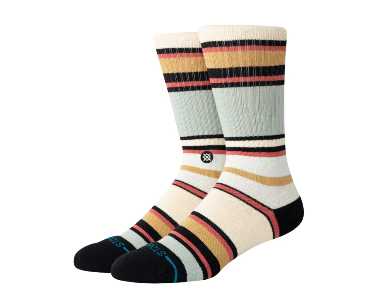 On a white background, two foot models hold a pair of crew socks that feature a black toe and heel, a blue band with the word 