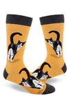 A pair of yellow heather men's socks rests on a white background. The socks feature a prominent image of a tuxedo cat with its butthole in the viewer's face and its head turned to look at the viewer.