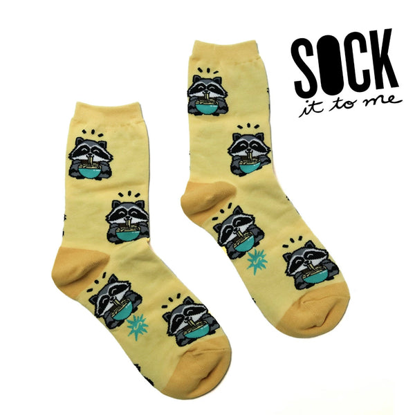 Yellow socks with raccoons eating ramen design on a white background