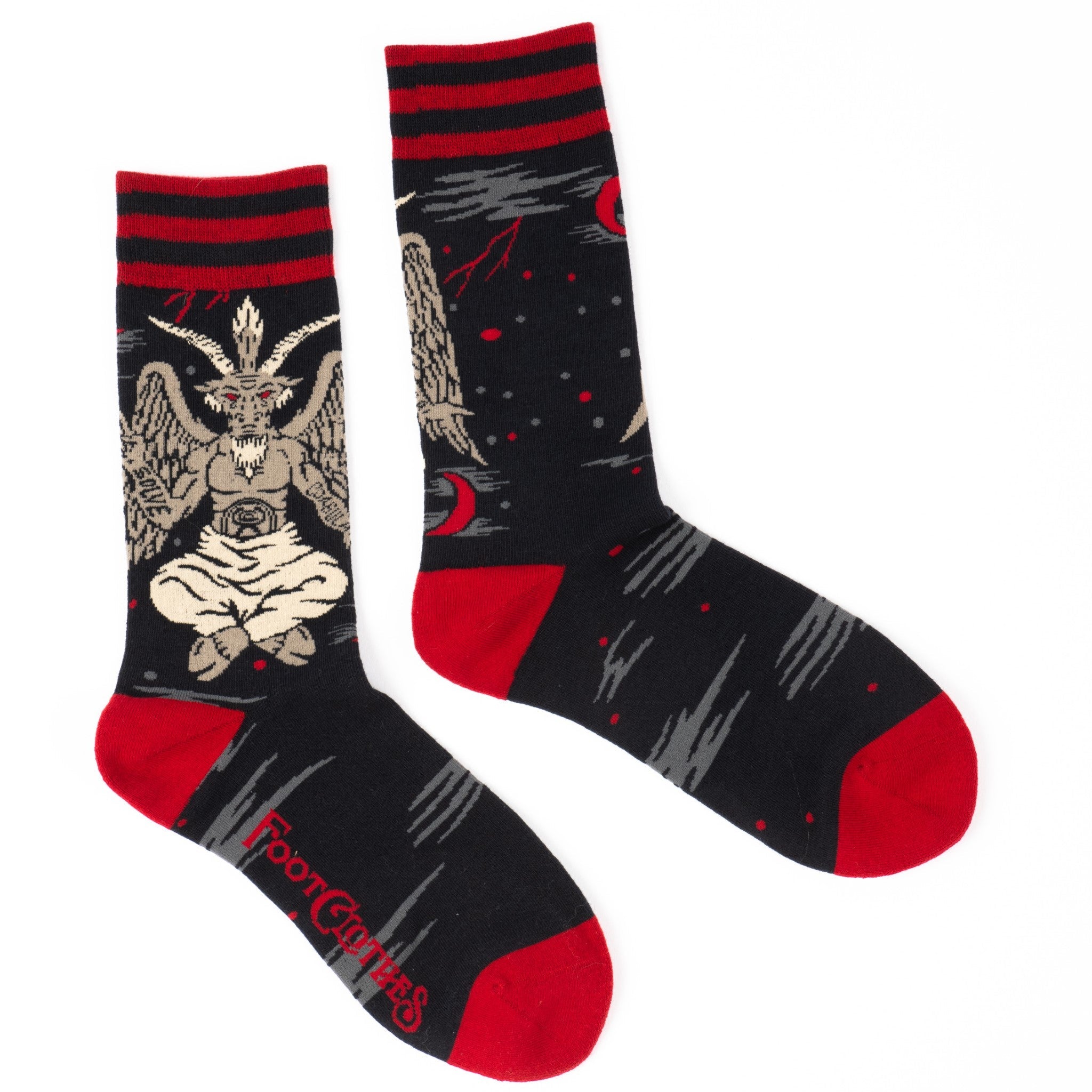 Shown in a flatlay, a pair of unisex crew sock sin black with a red heel and toe. The Cuff is striped red and black while the leg of the sock features a depiction of Baphomet, horns and all!