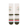 a flatlay of a pair of ivory socks with a green toe and red and green stripes on the ball of the foot with a minimal line drawing of the california bear in green with text above and below that reads california est. 1850