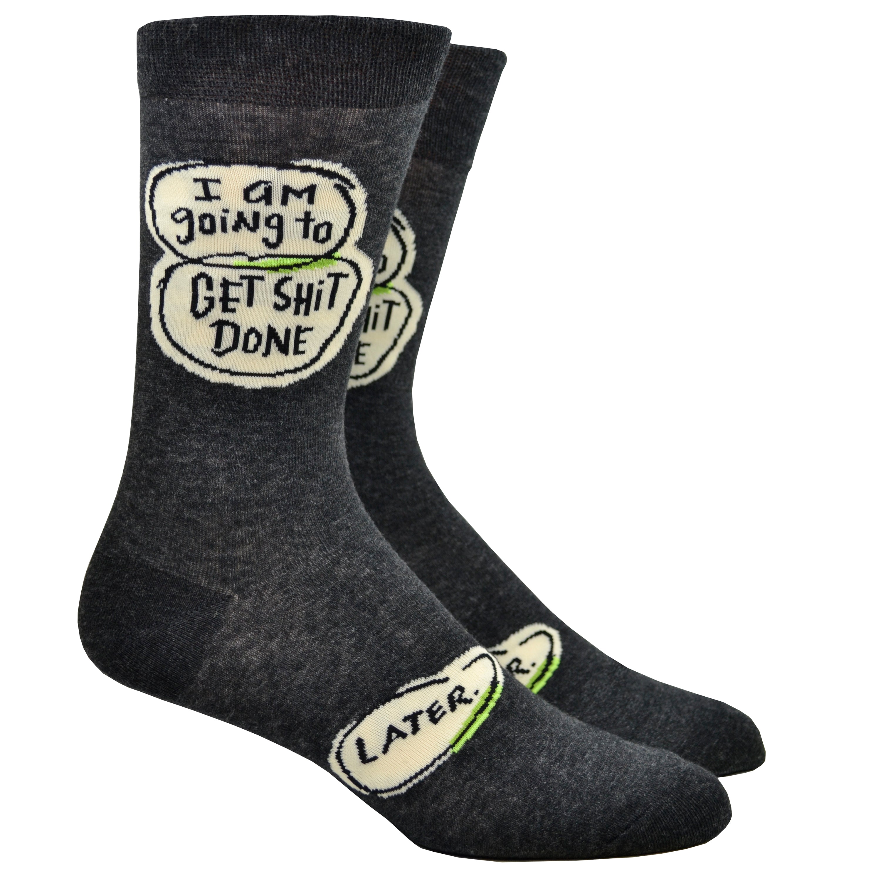 Shown on a leg form, these dark gray cotton funny men's crew socks by the brand Blue Q have word bubbles with the words 