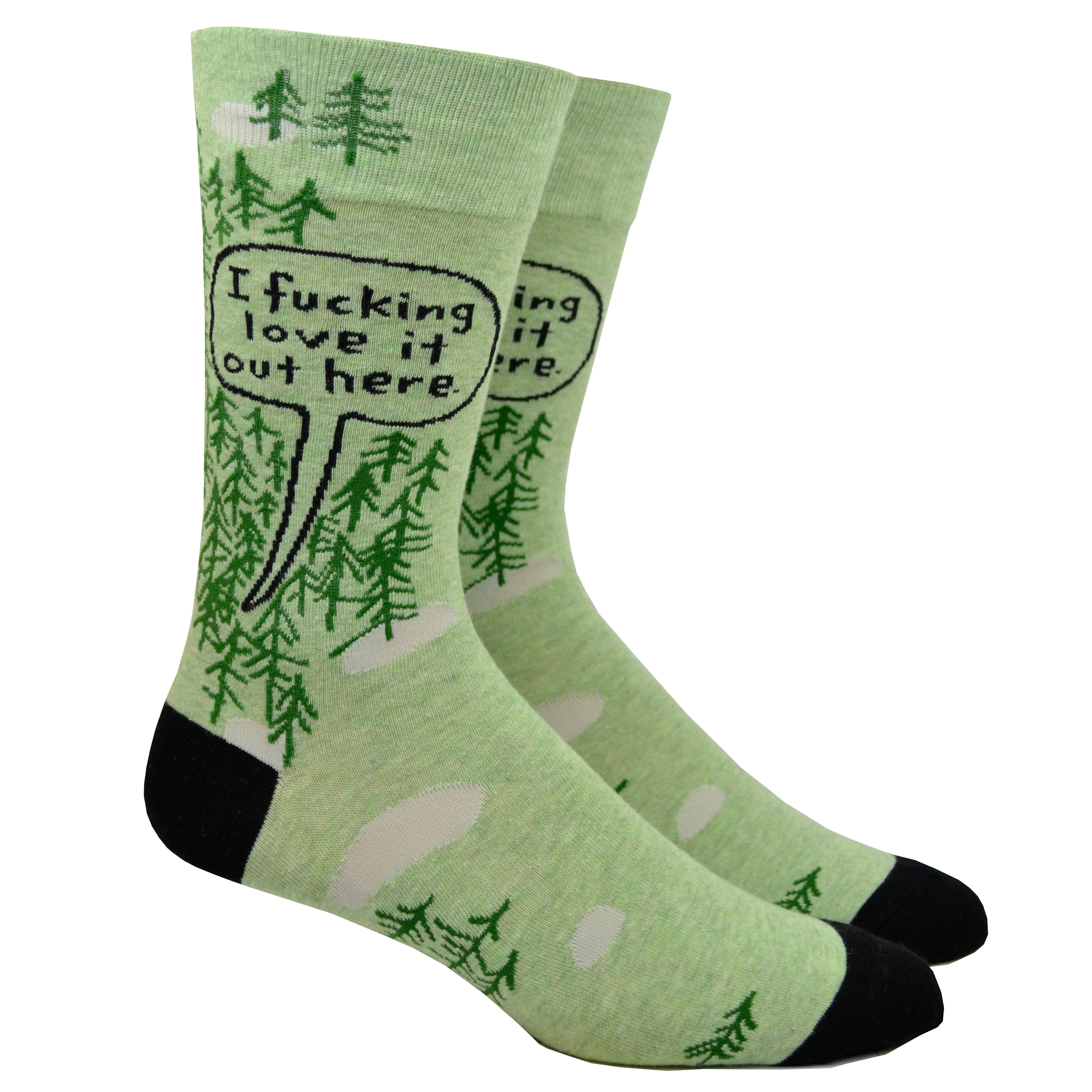Shown on a leg form, these green cotton men's crew socks with a black heel and toe by the brand Blue Q feature simplistic trees with a large quote bubble proclaiming 