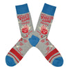 Shown in a flatlay, a pair of Blue Q brand men's cotton crew socks in grey with a blue cuff/heel/toe and 2 red stripes on the foot. The socks feature a cartoon man gaming in front of a TV with text that starts at the top of the sock and goes down onto the foot reading, "Video Game Socks, Game On, and On and On and On".