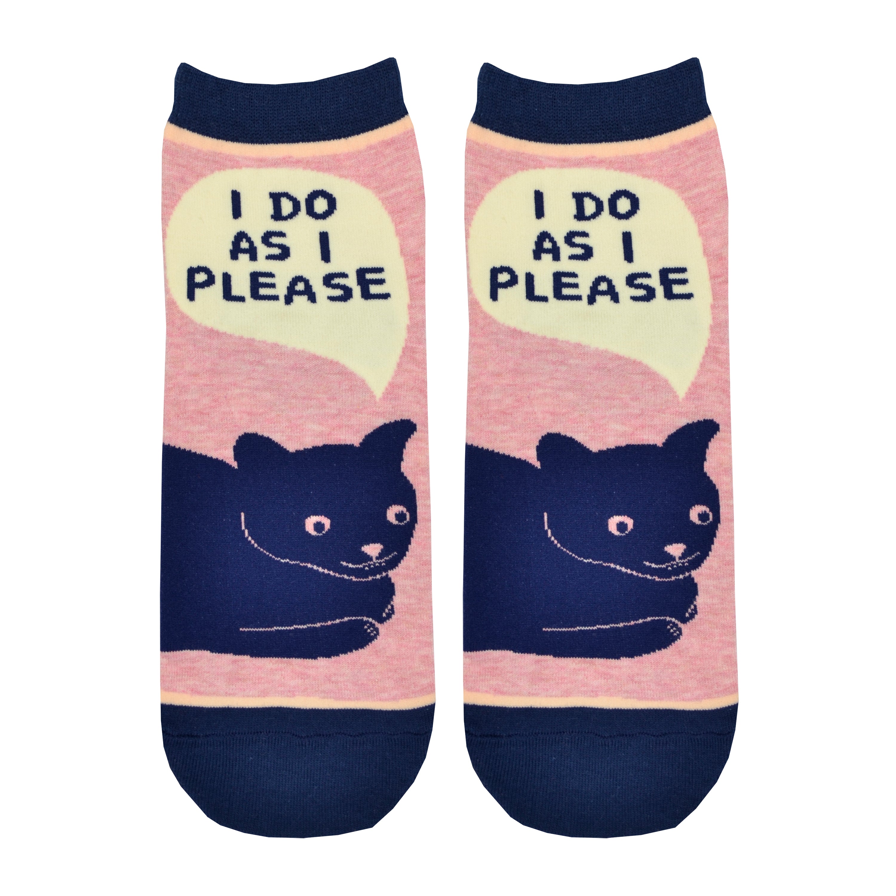 Shown in a flatlay, a pair of Blue Q brand women's ankle socks in light pink with a navy blue heel, toe, and cuff. The sock features a blue cartoon cat on the foot with the phrase, 