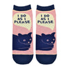 Shown in a flatlay, a pair of Blue Q brand women's ankle socks in light pink with a navy blue heel, toe, and cuff. The sock features a blue cartoon cat on the foot with the phrase, "I Do as I Please" in a speech bubble above the cat.