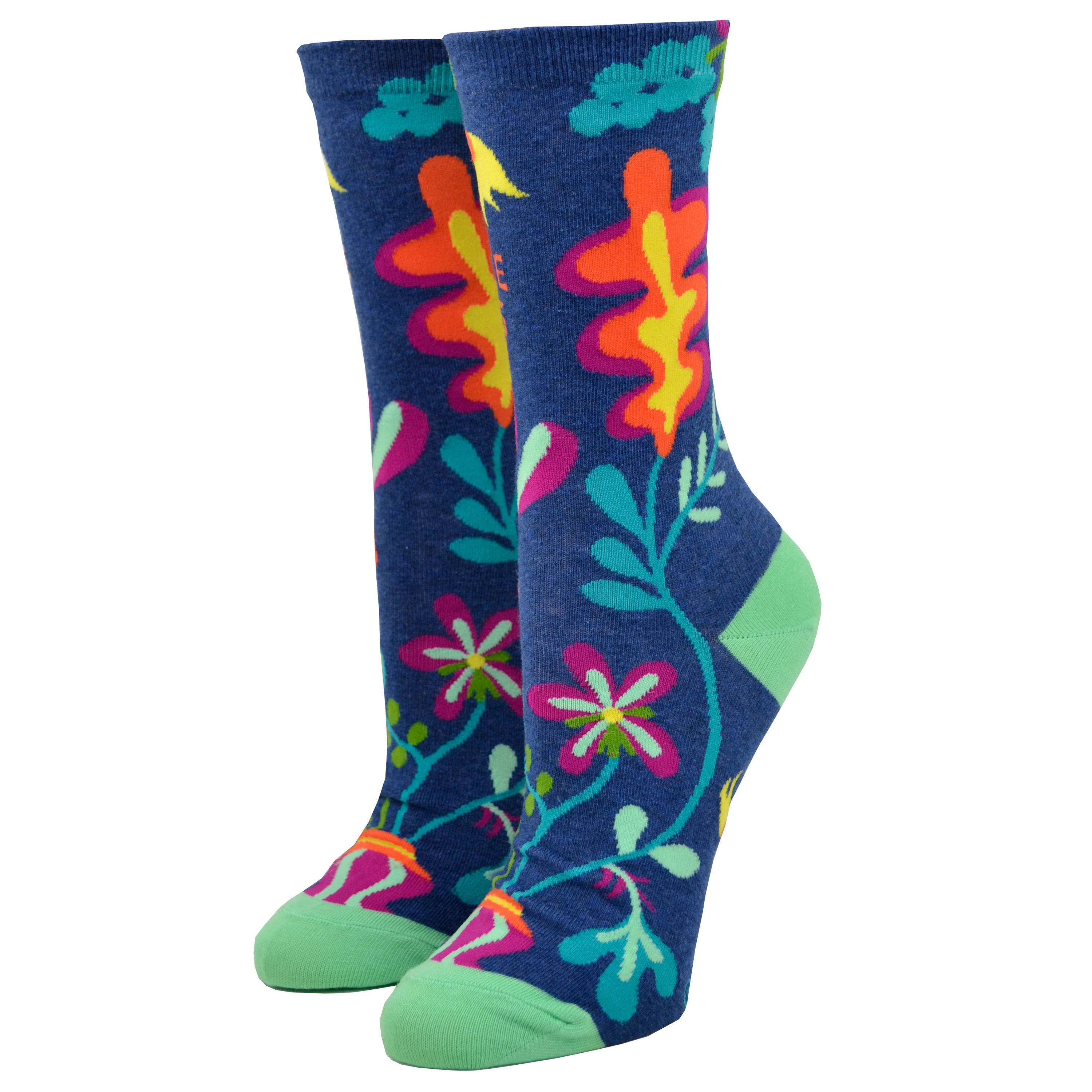 Shown on leg froms from the motif side, a pair of Blue Q brand women's nylon and combed cotton socks in navy blue with a teal heel and toe. These socks feature an all over motif of psychedelic inspired flowers and the phrase 