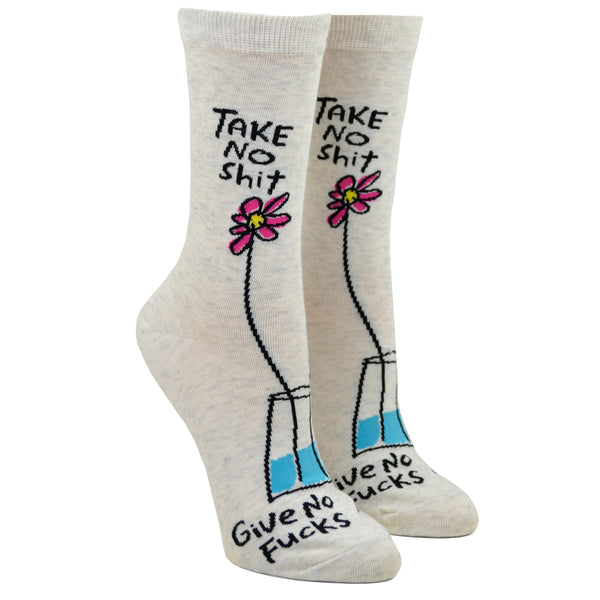 A dainty pink flower sits in a vase with the words "take no shit" written above the petals while "give no fucks" is followed on the foot of this women's white cotton Blue Q crew sock.