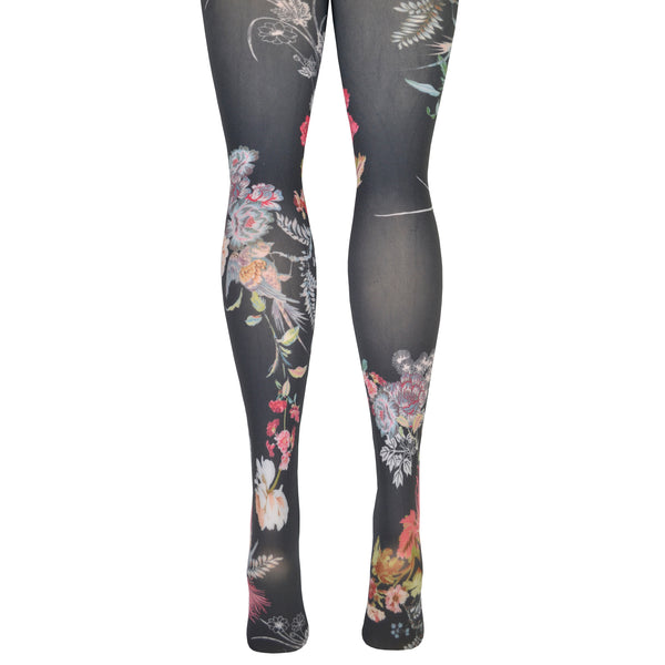 Shown from the back on leg forms, a pair of grey tights with an all over pink, blue, green, and yellow floral design. Each leg of the tight features a different orientation of the floral design.