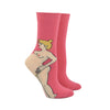 Shown on leg forms, bright pink CouCou Suzette socks with a blonde, caucasian, naked  pregnant woman. The woman's belly makes the ankle of the sock.