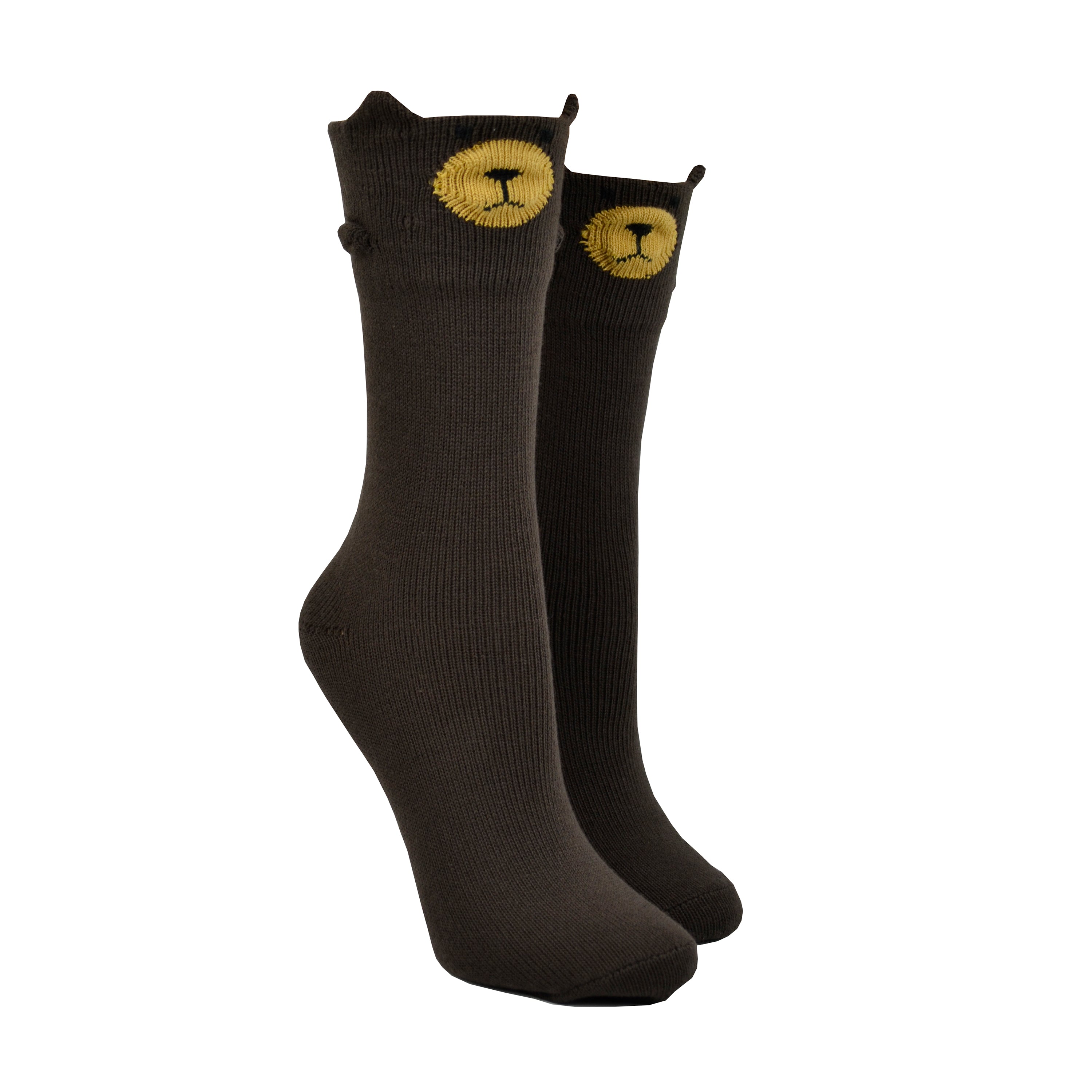 Shown on a foot mold, a pair of Foot Traffic, brown cotton women's crew socks with three dimensional pattern of cute bear