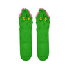 Shown in a flatlay, a pair of Foot Traffic brand cotton kids crew socks in green. The top of these socks features a fun alligator mouth design with yellow eyes, pink gums, and white teeth.